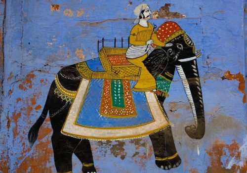 Blue house facade in streets of of Jodhpur, also known as “Blue City” due to the vivid blue-painted Brahmin houses, Jodhpur, Rajasthan, India